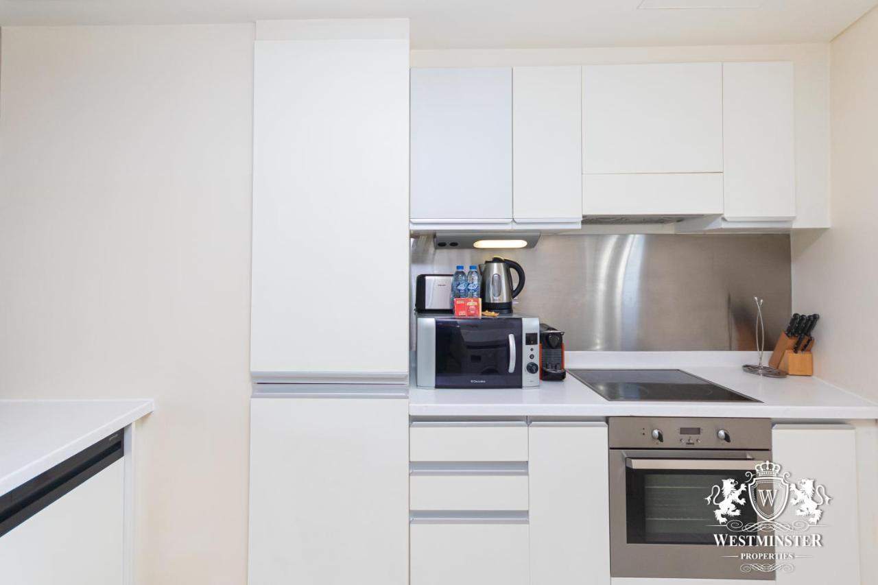 Westminster Dubai Mall Exterior photo A typical kitchen in a Westminster apartment